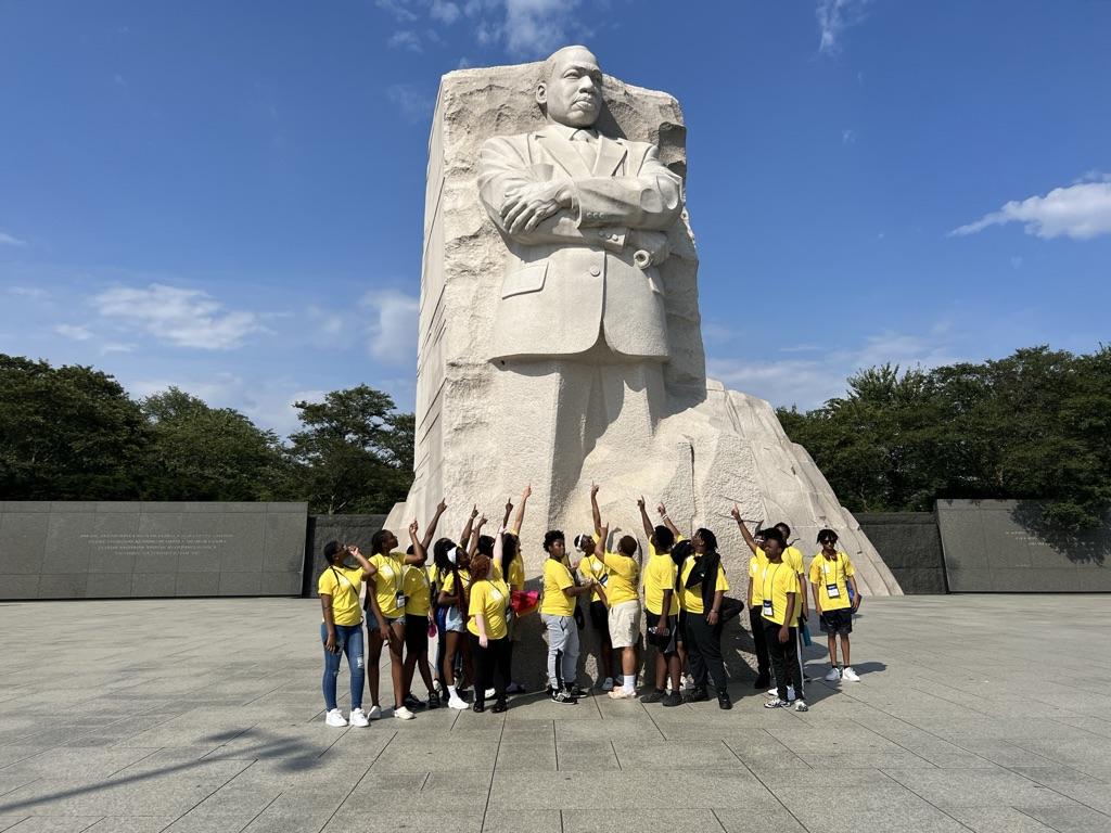 Picture of students in front of the Martin Luther King, Jr. Memorial during the 2023 Summer trip to Washington, DC. 